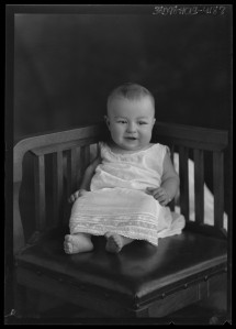 Born, Julius. [Portrait of Baby Sitting in Chair],  University of North Texas Libraries, The Portal to Texas History; crediting River Valley Pioneer Museum, Canadian, Texas.